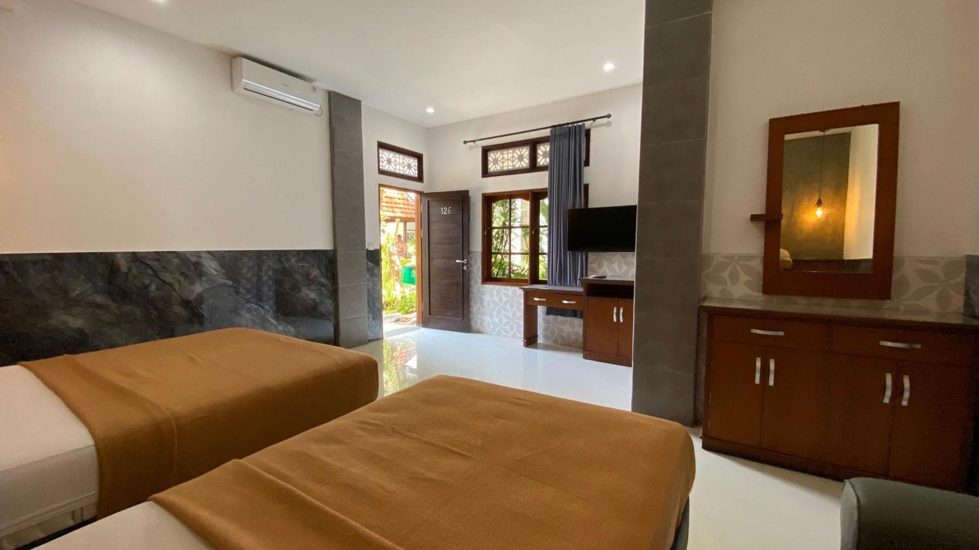 Sandat Hotel Legian Экстерьер фото