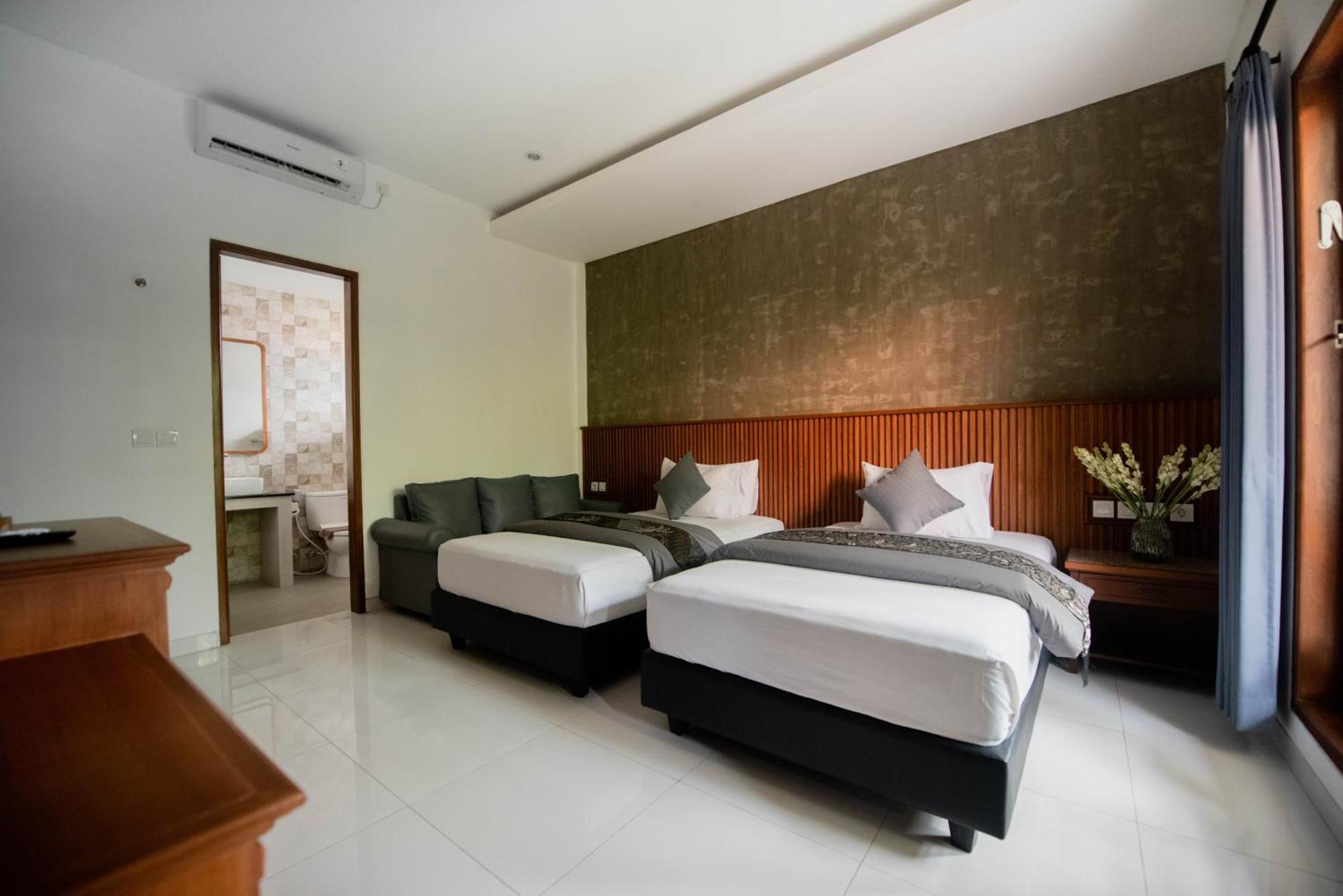 Sandat Hotel Legian Экстерьер фото